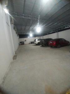 a parking garage with cars parked in it at Thanh Phước Hotel in Ấp Thanh Ðông