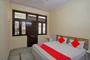 Postel nebo postele na pokoji v ubytování Hotel O The Pacific Hotel Parade Ground