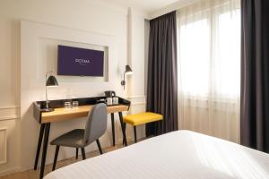 Ένα ή περισσότερα κρεβάτια σε δωμάτιο στο Dorma Sardinero +34 φωτογραφίες