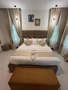 Ένα ή περισσότερα κρεβάτια σε δωμάτιο στο Sweet Homes Apartment +3 φωτογραφίες