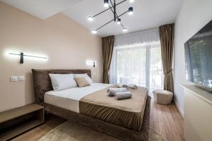 Ένα ή περισσότερα κρεβάτια σε δωμάτιο στο Newly Modern Designed 1BR Apartment