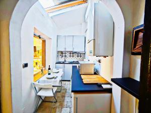 Kuchyň nebo kuchyňský kout v ubytování Nido d'amore Fiesole