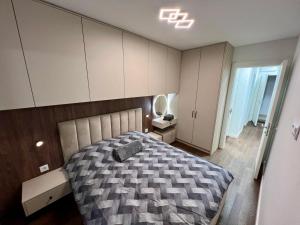 Postel nebo postele na pokoji v ubytování Impresia apartments 2