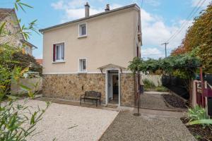 a large house with a stone facade at Home designed Especially for Groups in Vaires-sur-Marne