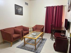 TV a/nebo společenská místnost v ubytování Al Reem Hotel Apartments + 6 fotografií