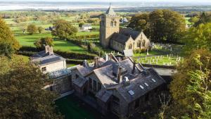 an aerial view of a castle with a church at Old School House, Halkyn in Halkyn
