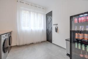 a laundry room with a washer and dryer at Home designed Especially for Groups in Vaires-sur-Marne +25 photos