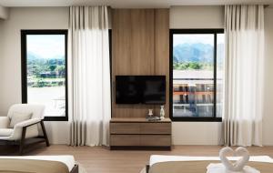 Μια τηλεόραση ή/και κέντρο ψυχαγωγίας στο Tulip Elegant Riverside Vangvieng