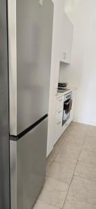 Kuchyň nebo kuchyňský kout v ubytování Habito Luxury Apartment - Breakbooking CY