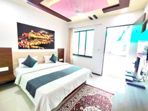 Postel nebo postele na pokoji v ubytování Jaigarh Palace Kumbhalgarh