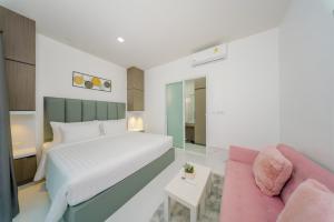 Postel nebo postele na pokoji v ubytování Lark Pool Villa Aonang Krabi + 153 fotografií