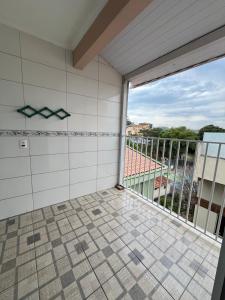 En balkon eller terrasse på Apartmento - Poços de Caldas