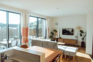 TV a/nebo společenská místnost v ubytování Lohas Resort 芥屋B