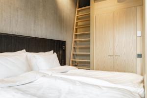 Postel nebo postele na pokoji v ubytování Break Sokos Hotel Himos