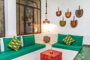 A seating area at Riad JiL & SPA