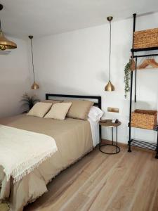 Ένα ή περισσότερα κρεβάτια σε δωμάτιο στο Ca l'Eli