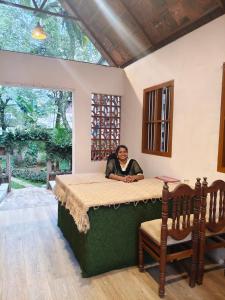 Postel nebo postele na pokoji v ubytování VEDHA AYURVEDIC panchakarma treatment centre