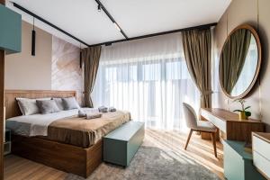 Ένα ή περισσότερα κρεβάτια σε δωμάτιο στο Nordic Pastel Hideaway - Studio with Balcony