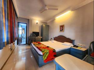 Katil atau katil-katil dalam bilik di Park Palace Hotel