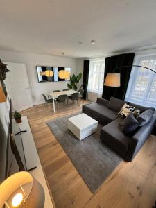 Posezení v ubytování Bavaria Home Apartments Geisenfeld