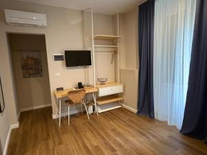Μια τηλεόραση ή/και κέντρο ψυχαγωγίας στο Sette Vele Rooms