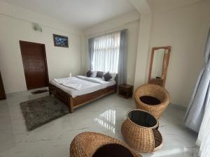 Katil atau katil-katil dalam bilik di Yangsel Homestay +14 gambar