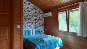 Postel nebo postele na pokoji v ubytování İzmir Yaşam Vadisi Oteli + 30 fotografií