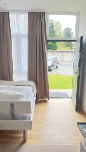 Postel nebo postele na pokoji v ubytování Baadenberger stay D