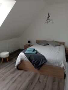 Postel nebo postele na pokoji v ubytování La Maison LUDO