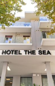 a building with a sign that reads hotel the sea at The Sea Hotel in Rimini