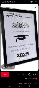 a computer screen with a graduation picture of a graduation cap at Emanalejawi in Amman