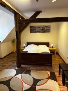 Postel nebo postele na pokoji v ubytování Apartament Familijny