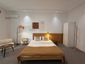 Ένα ή περισσότερα κρεβάτια σε δωμάτιο στο shymbulak gateway homestay