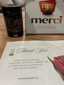 a complimentary card for a first class meal with a bottle of mercerntior at EUROPA22 Apartament z tarasem "Sen jak w pięciogwiazdkowym hotelu" - CENTRUM MIASTA w atrakcyjnym miejscu obok parku ze stawem i kortu tenisowego in Tomaszów Mazowiecki +32 photos