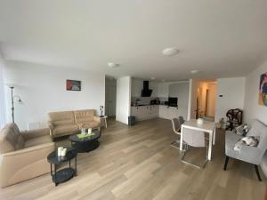 Posezení v ubytování Quartiercenter Wohnung 1