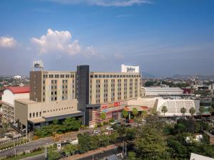 an overhead view of a city with buildings at Radisson Lampung Kedaton in Bandar Lampung