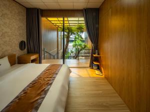 Postel nebo postele na pokoji v ubytování Hilltop Chill Homestay Mui Ne + 73 fotografií