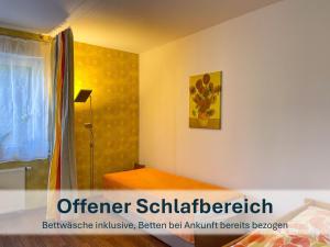 Ένα ή περισσότερα κρεβάτια σε δωμάτιο στο Dresden, Ferienhaus Strietzel