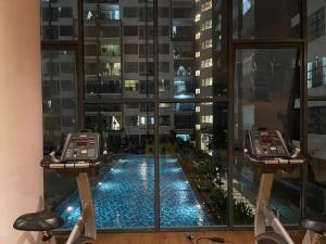 a view of a swimming pool from a hotel room at Zeva Residence Seri Kembangan 2BR in Seri Kembangan