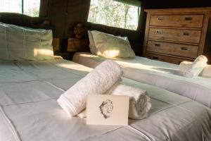 Postel nebo postele na pokoji v ubytování Khanya Conservation Camp + 33 fotografií