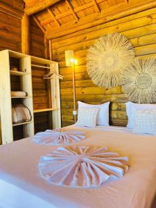 Postel nebo postele na pokoji v ubytování Chalet Paraiso Canoa 3 na praia - Canoa Quebrada