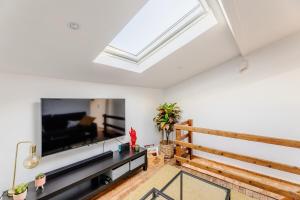 Μια τηλεόραση ή/και κέντρο ψυχαγωγίας στο La loge premium - Bouscat au pied du tram