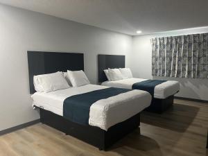 Ένα ή περισσότερα κρεβάτια σε δωμάτιο στο Motel 6 - Las Vegas, NV – Downtown Fremont St Experience