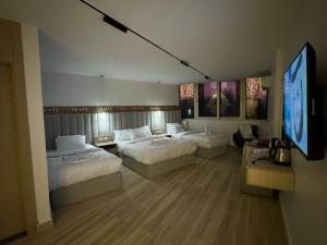 Voodi või voodid majutusasutuse Nefertiti Royal Hotel toas