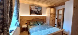 Ένα ή περισσότερα κρεβάτια σε δωμάτιο στο Ai Vòlti