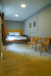 Postel nebo postele na pokoji v ubytování Villa Ecco Cubo