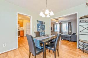 a dining room and living room with a table and chairs at Reilly Road Refuge in Fort Bragg
