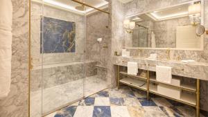 a bathroom with a shower and a sink at Hotel Palazzo Giovanelli e Gran Canal in Venice +84 photos