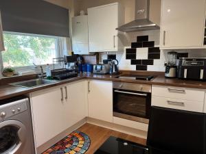 Η κουζίνα ή μικρή κουζίνα στο Cosy and quiet apartment