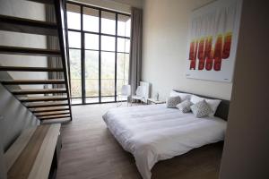 Ένα ή περισσότερα κρεβάτια σε δωμάτιο στο The Silk Valley